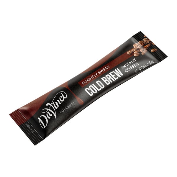 A black and red DaVinci Gourmet instant coffee packet.