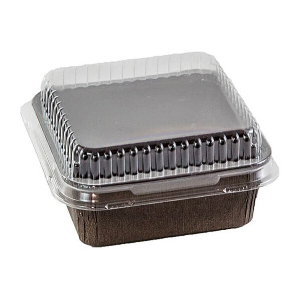 A clear rectangular plastic lid on a Novacart baking mold.