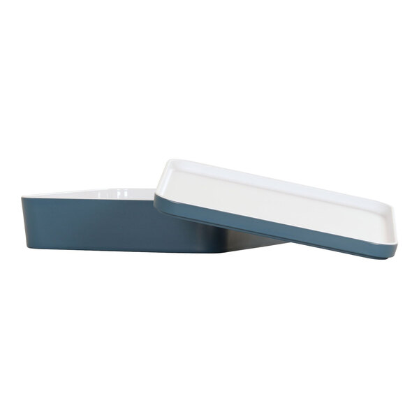 A white and blue square stone melamine bento box with a lid.
