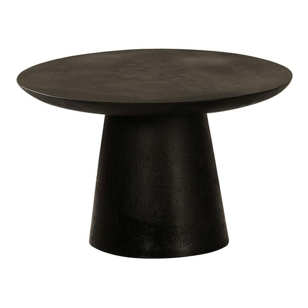 A black Cal-Mil cake pedestal on a black table.