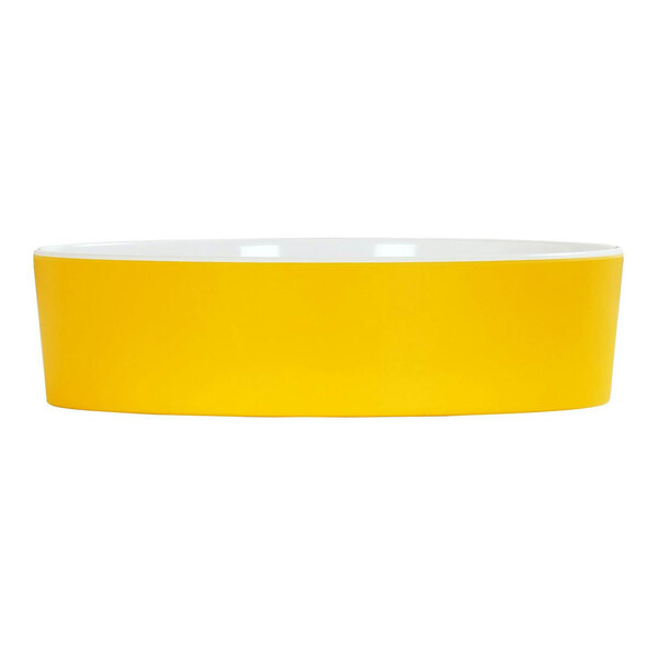 A Cal-Mil sunshine yellow melamine bowl with a white rim.