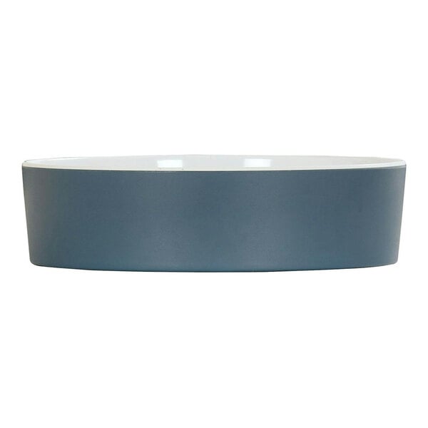 A Cal-Mil stone blue melamine bowl with a white rim.