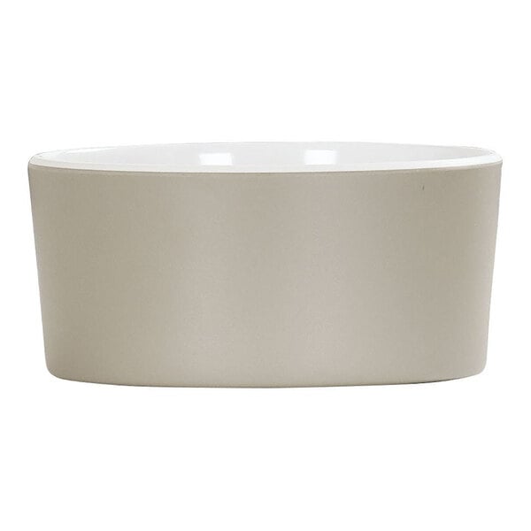 A white round melamine bowl with a white background.
