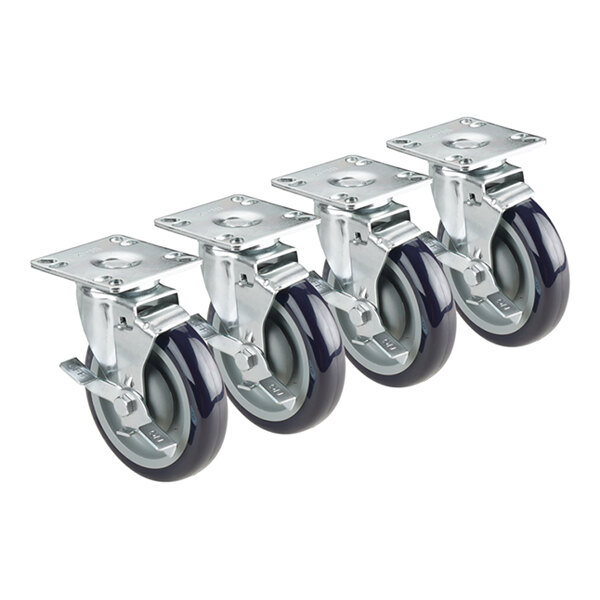 A row of Krowne plate casters with black wheels and side brakes.