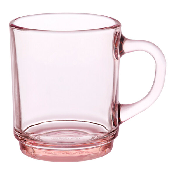 A clear glass mug with a handle.