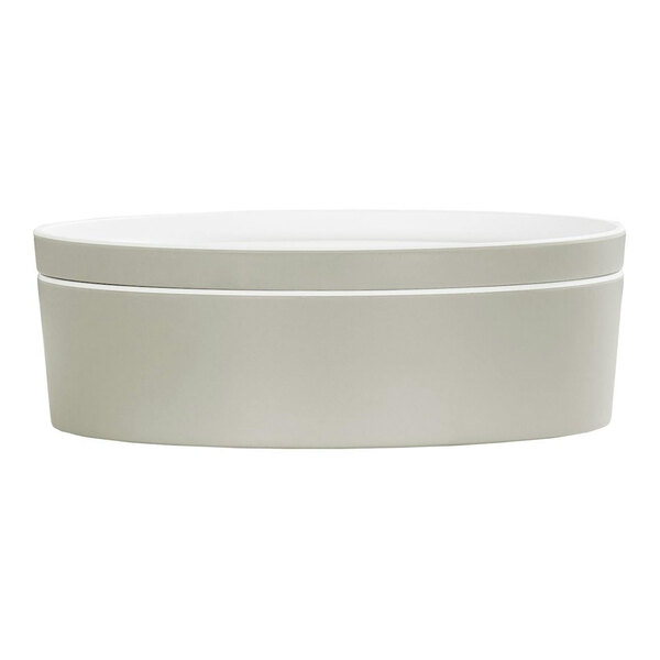 A white round Cal-Mil melamine bento box with a lid.