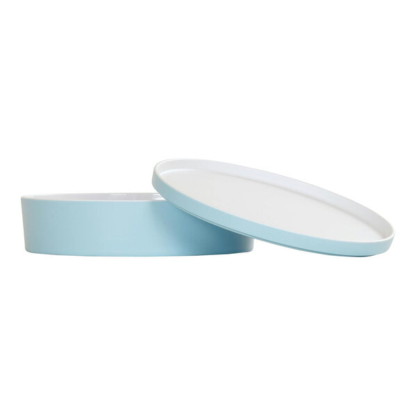 A blue and white round Cal-Mil melamine bento box with a lid.