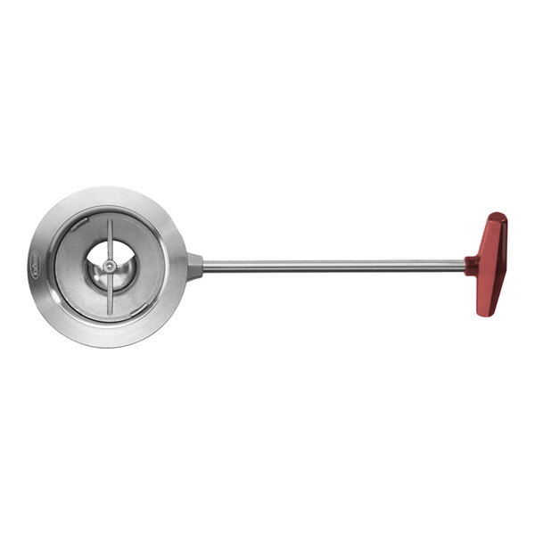 A circular stainless steel waste valve with a red twist handle.