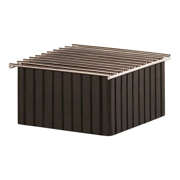 A black ribbed wood chafer alternative with metal rods on top.
