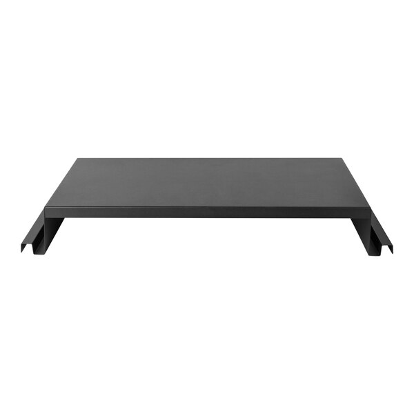 An Eastern Tabletop black metal rectangular riser.