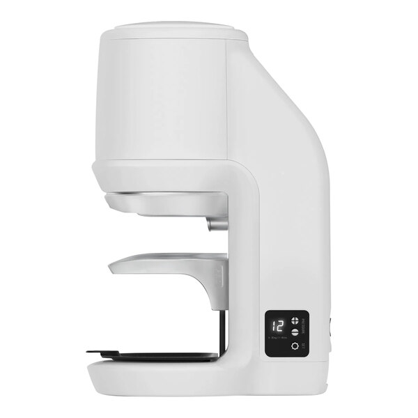 A white automatic high-performance espresso tamper with a digital display.