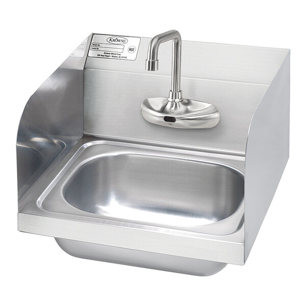 A Krowne stainless steel wall-mounted hand sink with a Diamond Series electronic sensor faucet.