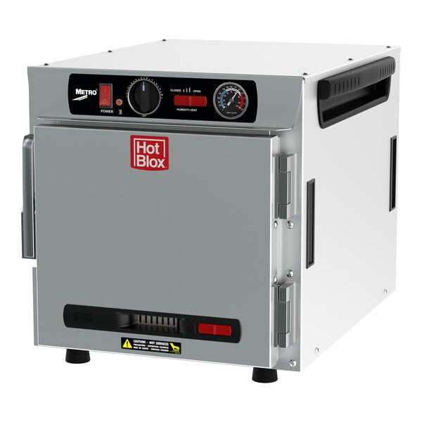 A white rectangular Metro HotBlox heated holding cabinet with dials and buttons.