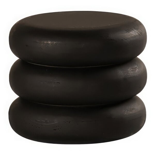A stack of black round display stands.