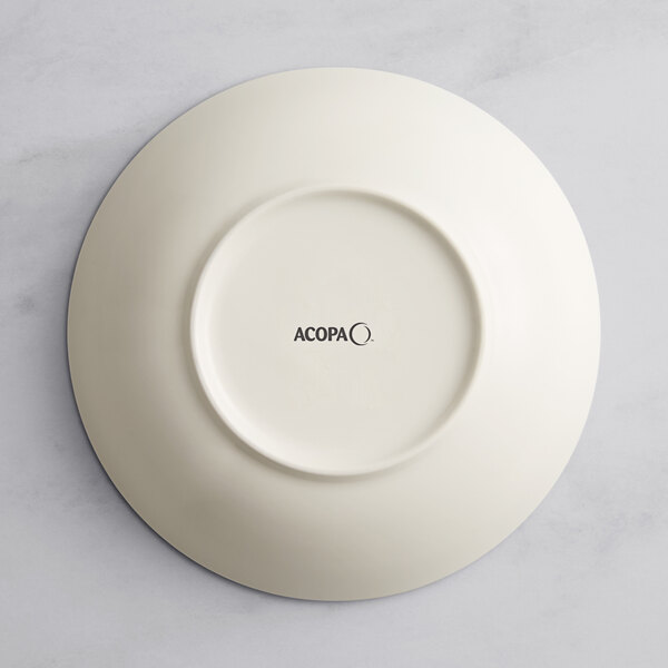 A gray porcelain Acopa Cape deep coupe plate with black text on it.