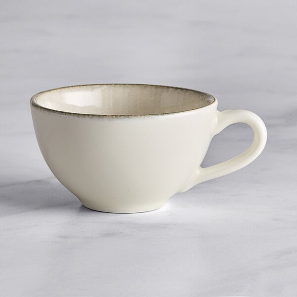 An Acopa Cape white porcelain cup with a rim.