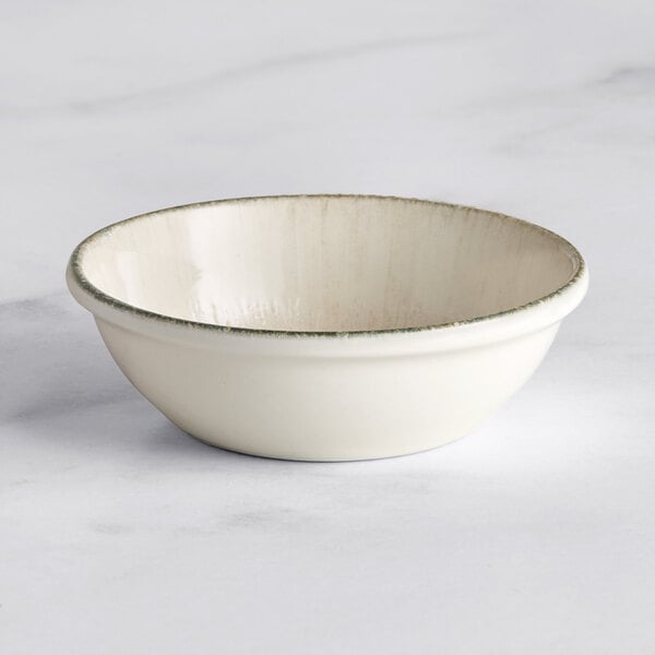 A small round gray porcelain ramekin.