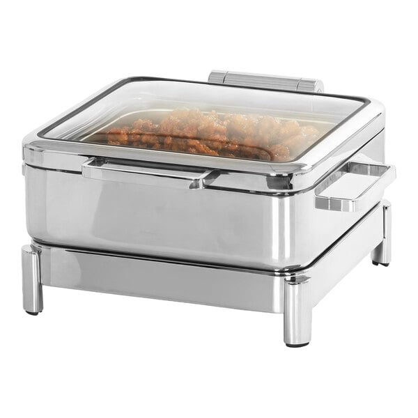 A stainless steel chafer on a stand with food inside.