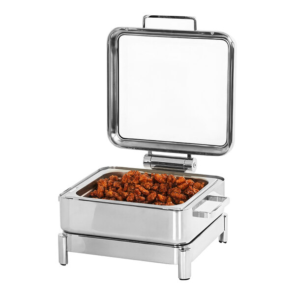 A stainless steel rectangular chafer with food in it on a stand.