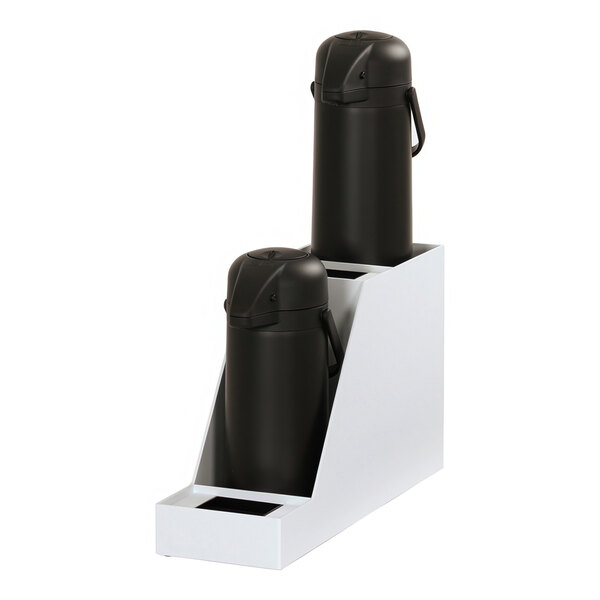 A white plastic rack holding two black airpots.