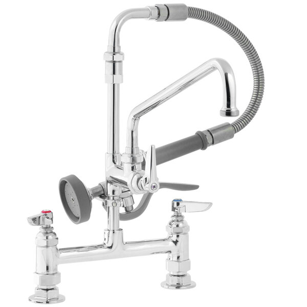 A T&S chrome deck-mounted pre-rinse faucet with two handles and a sprayer.