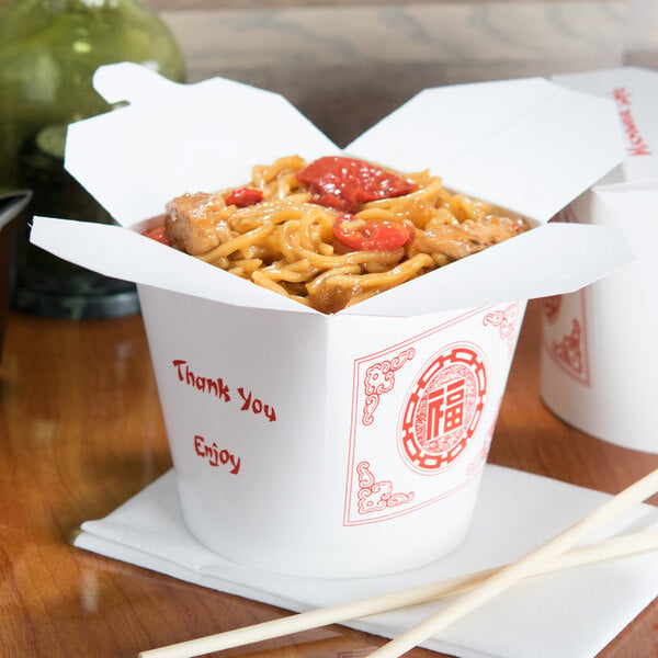 Chinese take out container filled with lo mein