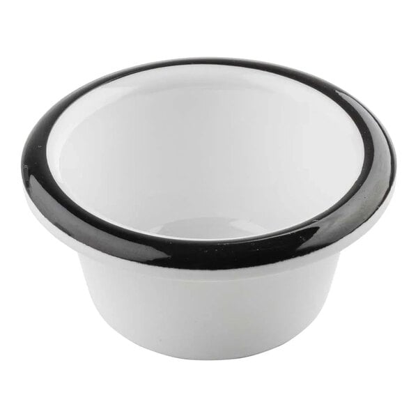 A Tablecraft white melamine ramekin with black rim.