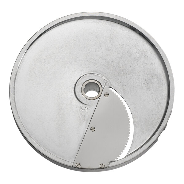 An Edlund VariCut micro serrated slicing disc, a circular metal object with a circular blade.
