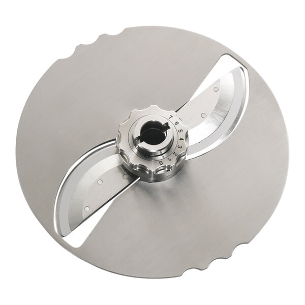 An Edlund VariCut stainless steel circular slicing disc with a circular blade.