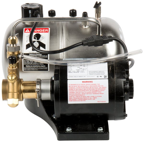 A McCann's Big Mac Fastflow Carbonator with a black and silver cylinder and a hose attached.