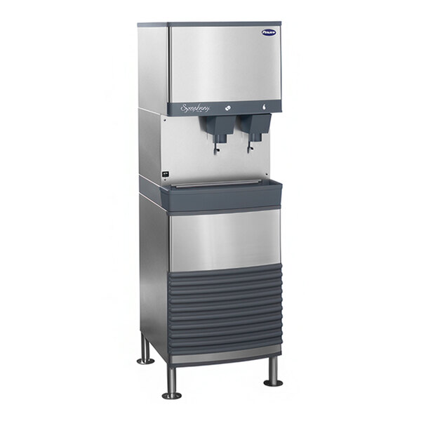 A white stainless steel Follett water cooled ice machine with two chewable ice dispensers.