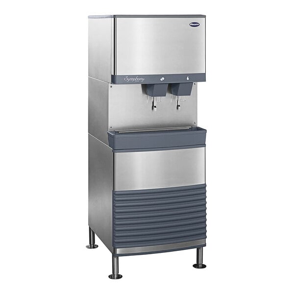 A stainless steel Follett ice maker and dispenser with two ice dispensers.