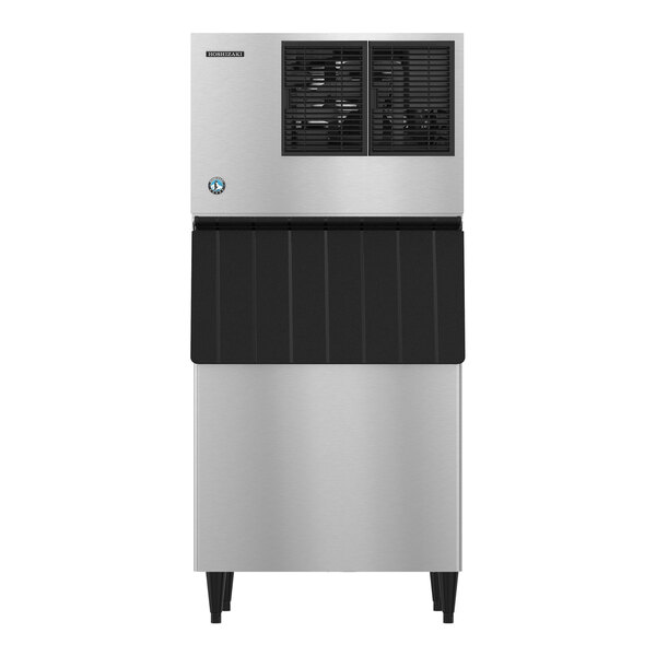 A silver machine with a black door.