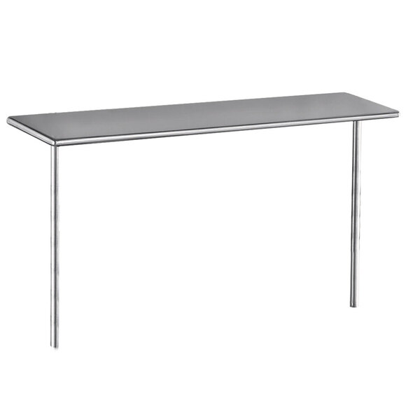 An Advance Tabco stainless steel shelf mounted in the middle of a table.