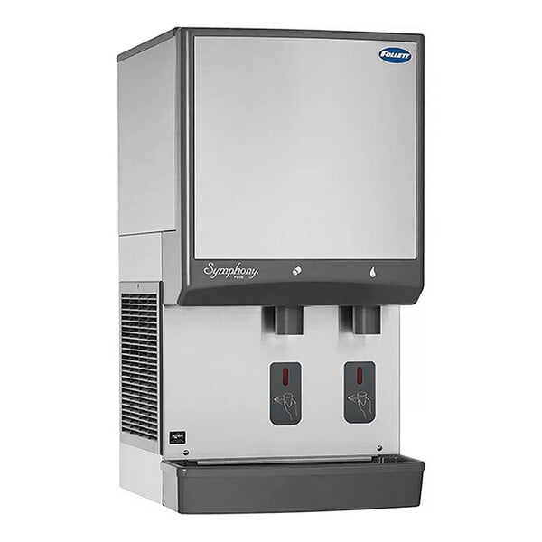 A white Follett countertop ice maker and water dispenser with a silver surface and two water dispensers.