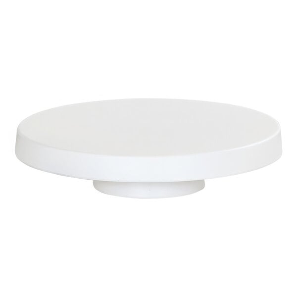 A white round Cal-Mil cake pedestal.