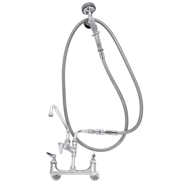 A silver T&S wall mounted pre-rinse faucet with a hose.