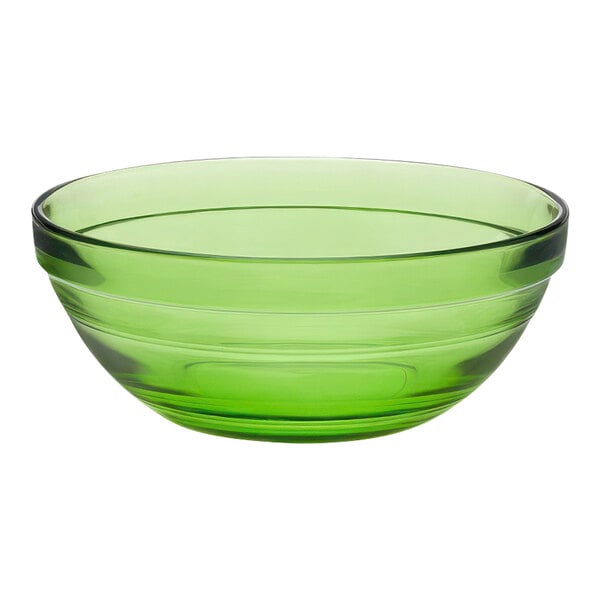 A green Duralex glass bowl with a rim.