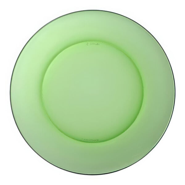 A green Duralex glass dinner plate with a black rim.