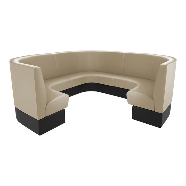 A tan and black curved sectional booth with a table.
