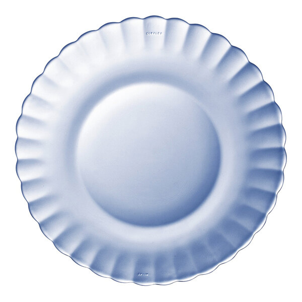 A close-up of a white Duralex Picardie Marine glass dessert plate with a scalloped edge.