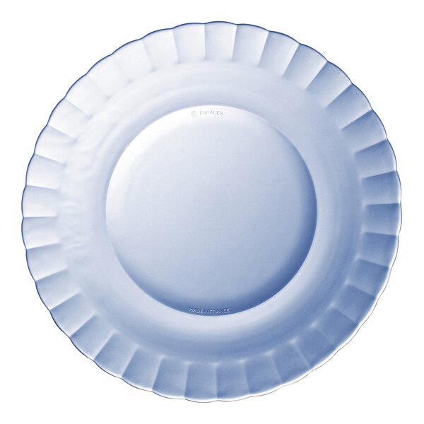 A close-up of a white Duralex Picardie Marine glass soup plate with a scalloped edge.