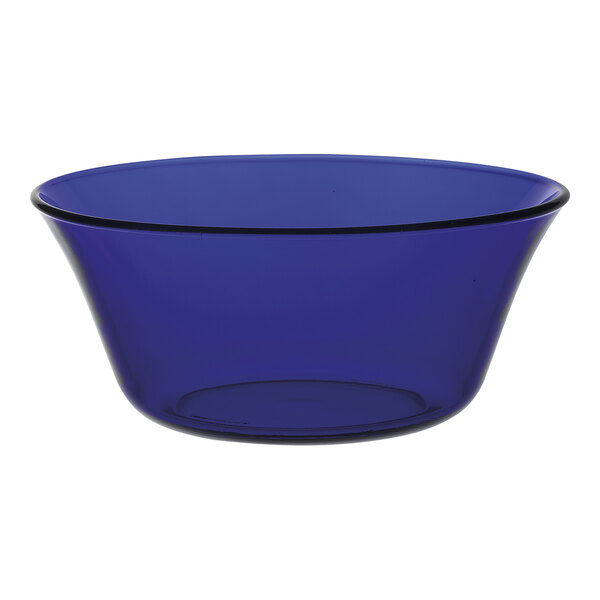 A Sapphire blue Duralex glass bowl with a black rim.