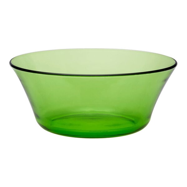 A green Duralex glass bowl with a black rim.