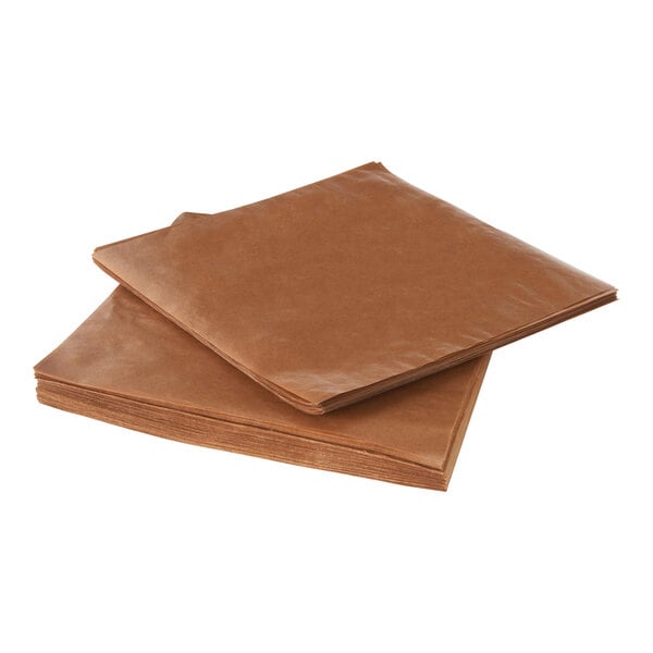 A stack of Lavex waxed brown packing paper sheets.