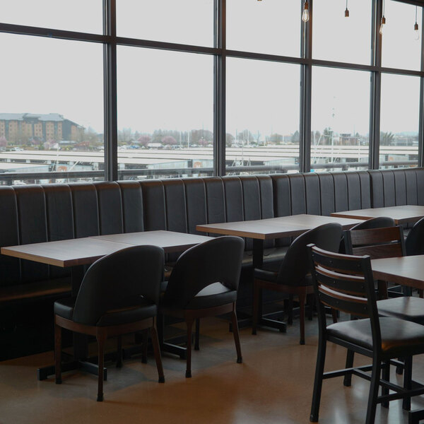 A 60-inch long ebony channel single back booth with a 42-inch high backrest, designed for restaurant seating.