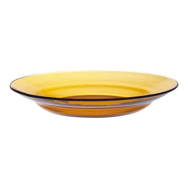 A yellow glass bowl with a black rim.