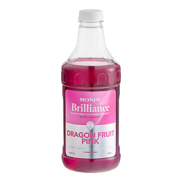 A plastic bottle of Monin Brilliance Sugar-Free Dragon Fruit Pink Natural Energy Concentrate.