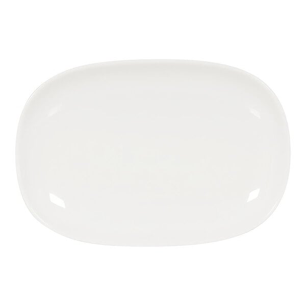 A white Cal-Mil melamine oval plate with a raised rim.