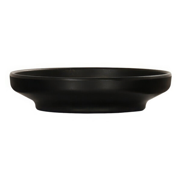 A Cal-Mil black melamine bowl/plate on a white table.